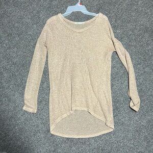 Maurice’s small tan tunic